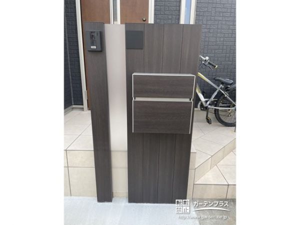 ステンレスの質感を活かした美しい表札を施工しました。