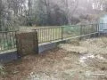 台風被害を受けた境界フェンスの再設置工事