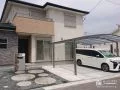 丸い飛び石のアプローチが優しい新築外構工事
