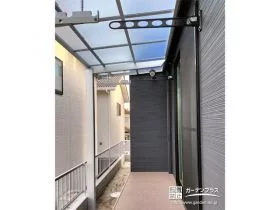 急な雨も防げる物干しスペースに[施工後]