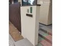 天然石調のグリーンの表札がポイントに。