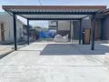 住宅とのコーディネートを叶える木調デザインのカーポート