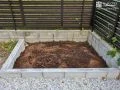 【施工後】コンクリートブロックで縁取ったメリハリのある植栽スペースへ