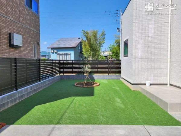 サークル状の花壇がポイントになるお庭リフォーム工事