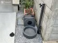 無駄のない洗練されたデザインの立水栓とガーデンパン