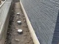 【施工前】雨水桝が飛び出た状態だった犬走り