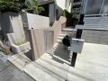 アプローチにタイルを貼りデザイン性を高めたリフォーム工事