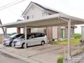 ナチュラルお住まいにも調和する重厚なカーポートの設置工事