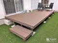 芝生上で遊ぶお子様をデッキ上で見守れる心地よいお庭リフォーム工事