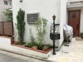 白いお住まいにマッチするナチュラルで明るい外構リフォーム