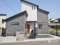 広々とした門周りがゆとりある高級感を演出するモダンな新築外構