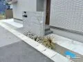 高級感漂うタイル門柱が住まいの格を一層引き立てる新築外構
