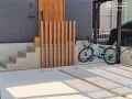 玄関の目隠しをするナチュラルなスリットフェンス