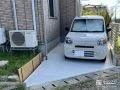 前庭にコンクリートを打設し駐車スペースへ生まれ変わらせた工事