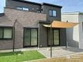シェード付きのテラスで夏場も快適にお過ごしいただける工事