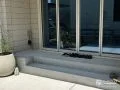 デザインブロックや花壇がアクセントになったお庭リフォーム工事