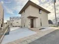 建物全体の一体感を意識したナチュラルテイストの新築外構