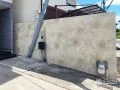 隣地境界へのデザイン性と機能性を両立させた建材パネル設置工事