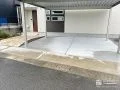 快適な駐車スペースと高級感あふれる乱形石貼りのアプローチ工事