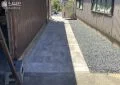 【施工後】門扉の動線上にインターロッキング舗装し、すっきりとしたアプローチ