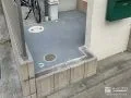 土間コンクリートで舗装した砂利スペース