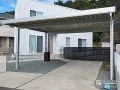 シルバーフレームで爽やかにお車を雨風から守るカーポート工事