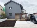 駐車スペースとアプローチで質感の違いを出したコンクリート工事