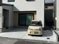 砂利敷きの駐車スペースにコンクリートを打設し快適にした工事