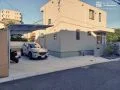 大きなタイル門柱がポイントのシンプルモダンな新築外構