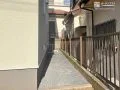 雑草対策とデザイン性を両立する犬走りの工事