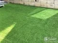 草むしりの手間をかけずに緑を楽しめる人工芝敷きのお庭
