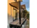 テラス屋根とウッドデッキで憩いの空間を提供したリフォーム工事