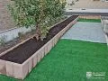 温かみのあるカラーのブロックでお庭に植栽スペースを設けた工事