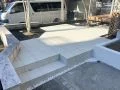 開放感あふれるタイルデッキで快適な庭空間に