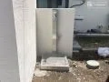 門柱の陰にひっそりと佇むスタイリッシュな立水栓