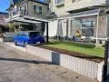 【施工後】フェンスや植栽を撤去してすっきりとした印象のお庭