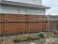 既存の植栽を伐採しフェンスを設置したローメンテナンス化工事