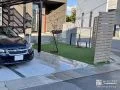 ポーチとつながるタイルデッキで実用性を向上