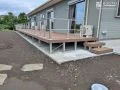 家族みんなで楽しめる広くて開放的なウッドデッキ設置工事