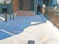 乱形石とレンガ目地がアクセントとなった玄関アプローチ