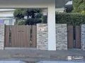 外観に統一感と重厚感を演出する門扉
