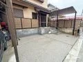 木目調デザインが心地よい駐車スペースの拡張リフォーム工事