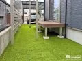緑鮮やかな景観を手間をかけずに一年中楽しめる人工芝敷設工事