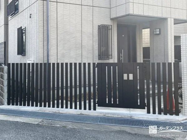 枕木と門扉を組合わせて設置しお住まいの防犯性を向上させた工事