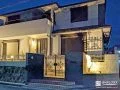 夜間に照明でアップライトされたお住まい