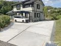 泥はねの心配が減り見た目もすっきりとした駐車スペースの舗装工事