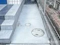 玄関ポーチ階段脇に打設した土間コンクリート