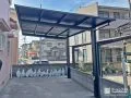 ブラックのフラット屋根が引き締まった印象のカーポート工事