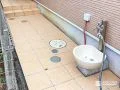 凸凹のあったアプローチにタイルを施工し歩きやすくした工事