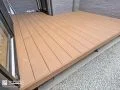 外と内をゆるやかにつなぐウッドデッキ
